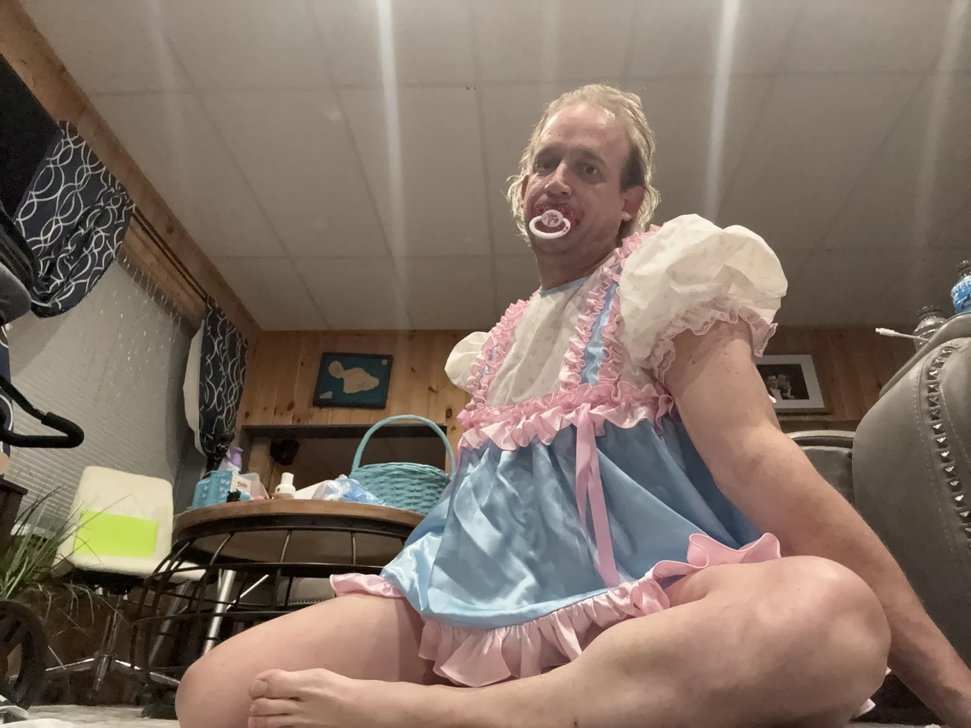 Jessica in a pale blue and pink outfit